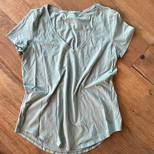 Lululemon pale turquoise green love t-shirt. Size 10 great condition!